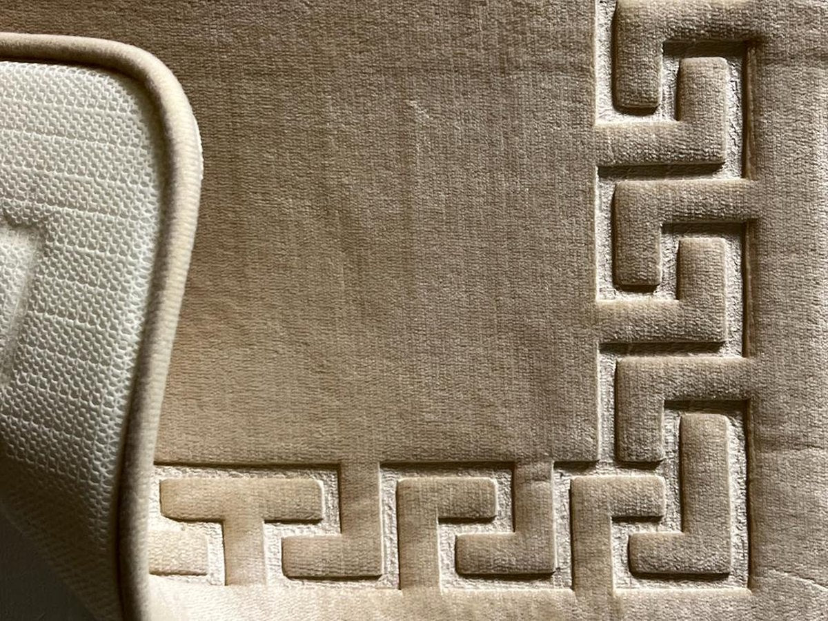 Juego de alfombrillas de baño con recorte.
